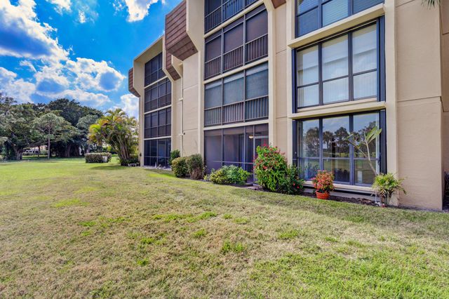 5390 Woodland Lakes Drive 102, Palm Beach Gardens, FL 33418