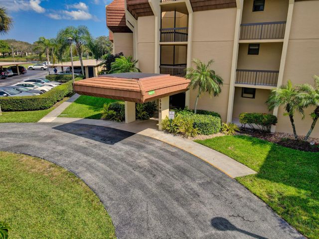 5390 Woodland Lakes Drive 102, Palm Beach Gardens, FL 33418