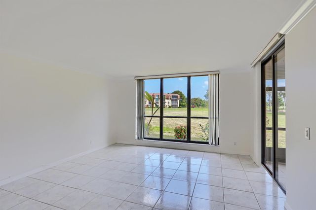 5390 Woodland Lakes Drive 102, Palm Beach Gardens, FL 33418