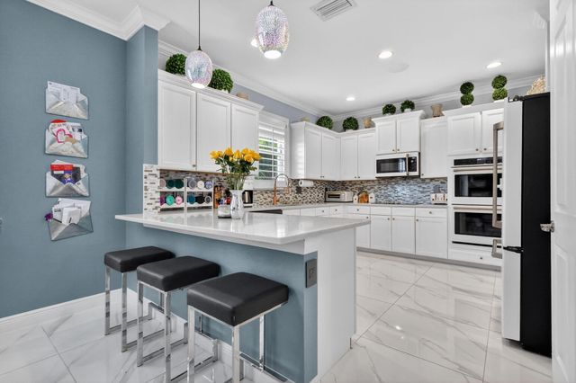 122 Andros Harbour Place, Jupiter, FL 33458