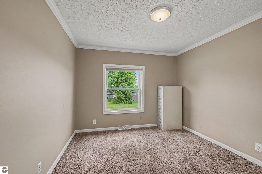 Image 6 of property listing at 1448 E Walton Road, Shepherd, MI 48883