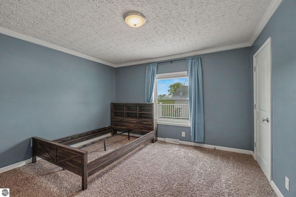 Image 7 of property listing at 1448 E Walton Road, Shepherd, MI 48883