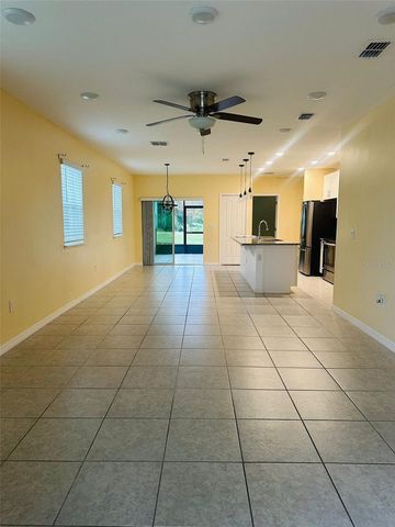 2221 CANYON BREEZE AVENUE, Kissimmee, FL 34746