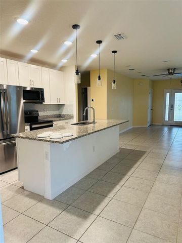 2221 CANYON BREEZE AVENUE, Kissimmee, FL 34746