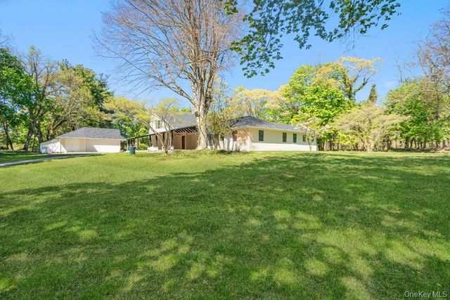 497 Woodbury Road, Cold Spring Harbor, NY 11724