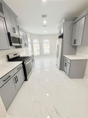 9714 Rich Mountain Court, Humble, TX 77396