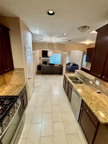 9730 Wheaton Edge Lane, Houston, TX 77095