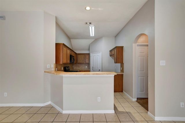 11843 Belle Court, Pinehurst, TX 77362