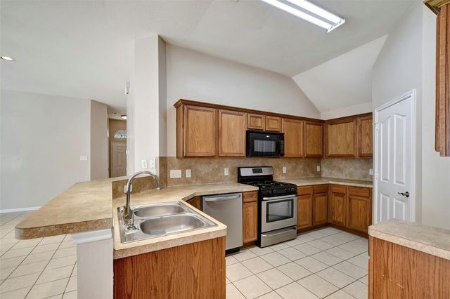 11843 Belle Court, Pinehurst, TX 77362