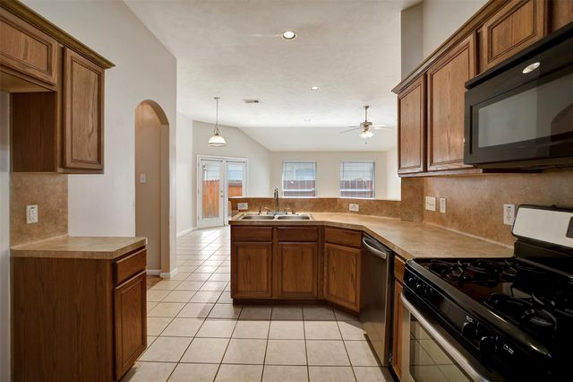 11843 Belle Court, Pinehurst, TX 77362