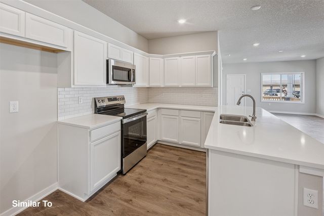 908 Sawgrass Drive, Norwalk, IA 50211