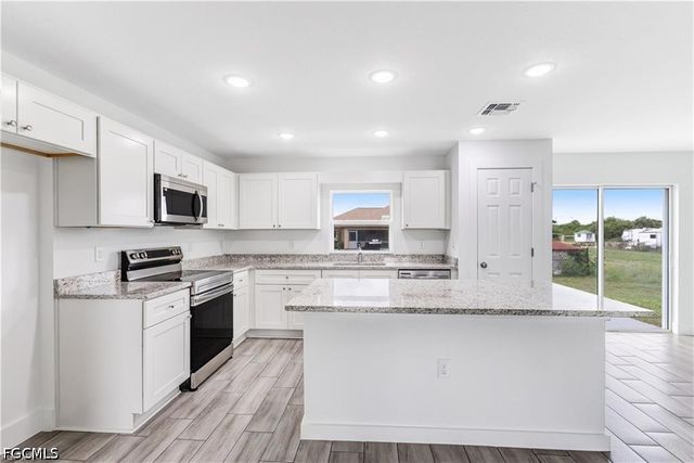 1242 Echard ST E, Lehigh Acres, FL 33974