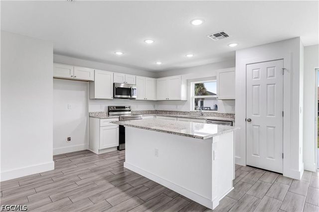 1242 Echard ST E, Lehigh Acres, FL 33974