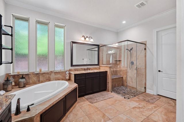 18 Sundown Ridge Place, The Woodlands, TX 77375