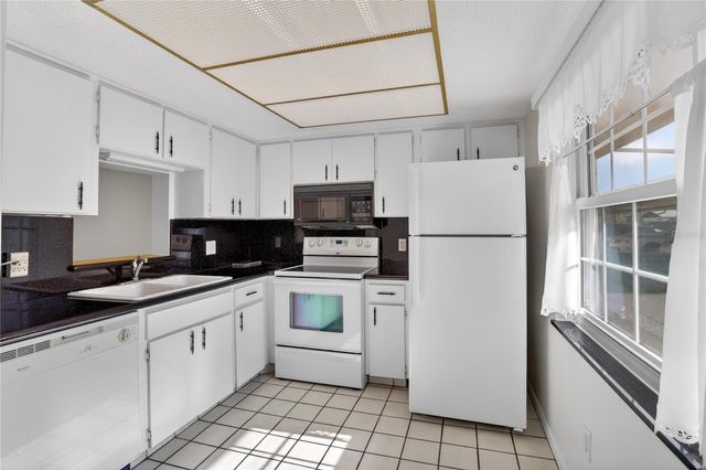1370 HEATHER RIDGE BOULEVARD 102, Dunedin, FL 34698