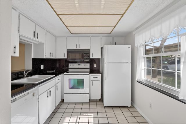 1370 HEATHER RIDGE BOULEVARD 102, Dunedin, FL 34698