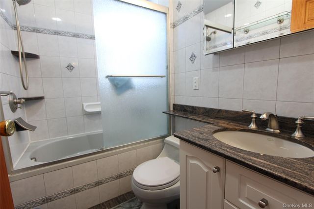 65-09 77th Place, Middle Village, NY 11379