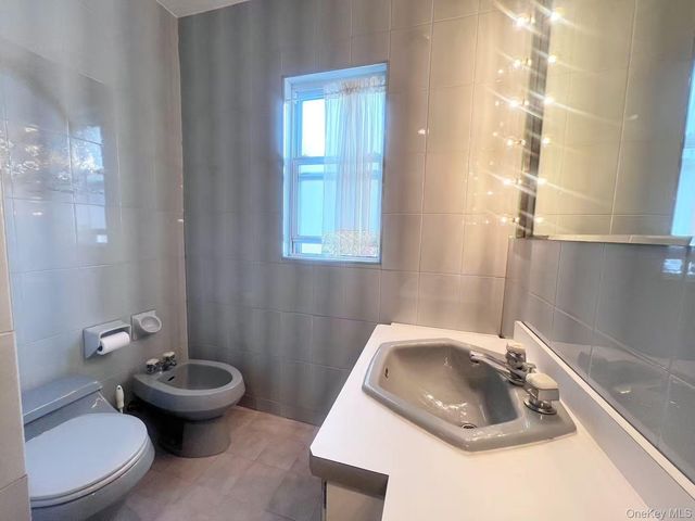 8407 63rd Avenue, Middle Village, NY 11379