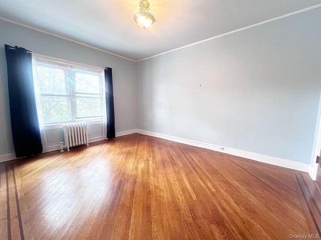 8407 63rd Avenue, Middle Village, NY 11379