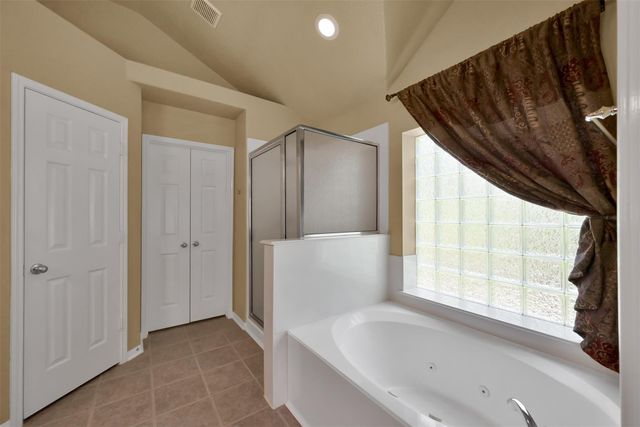 7 S Hawthorne Hollow Circle, Conroe, TX 77384