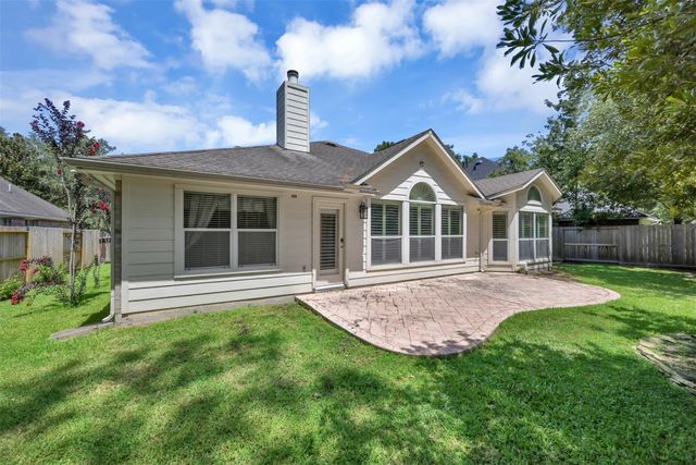 7 S Hawthorne Hollow Circle, Conroe, TX 77384