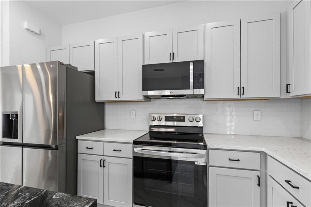Image 9 of property listing at 3921 NW 40th LN, Cape Coral, FL 33993