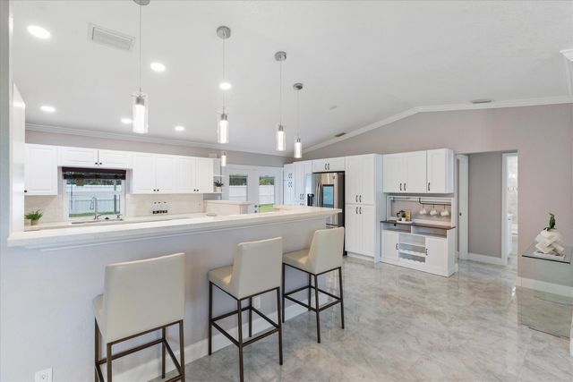 103 Prado Street, Royal Palm Beach, FL 33411