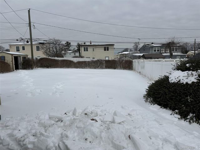 63 Morning Glory Road, Levittown, NY 11756