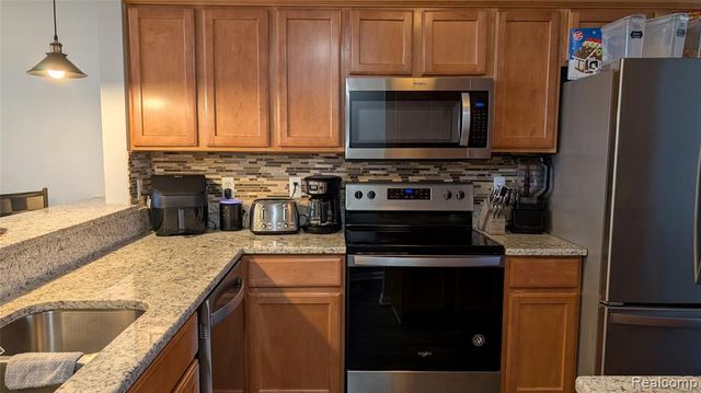 413 Village Drive, Walled Lake, MI 48390