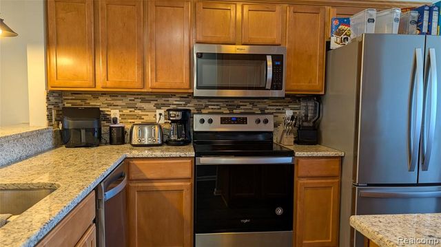 413 Village Drive, Walled Lake, MI 48390