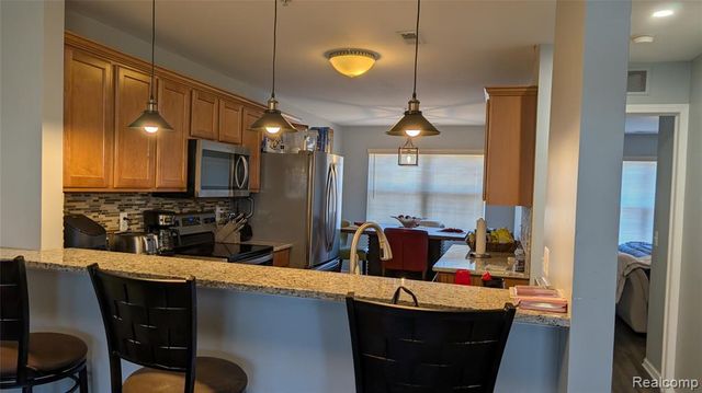 413 Village Drive, Walled Lake, MI 48390