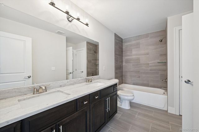 53779 Champlain Street, Macomb Township, MI 48042