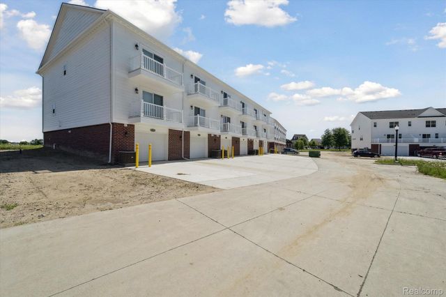 53779 Champlain Street, Macomb Township, MI 48042