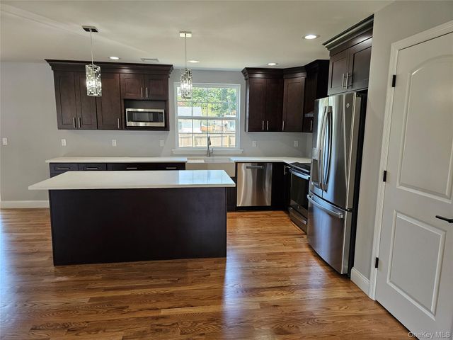 13 N Swezeytown Road, Middle Island, NY 11953