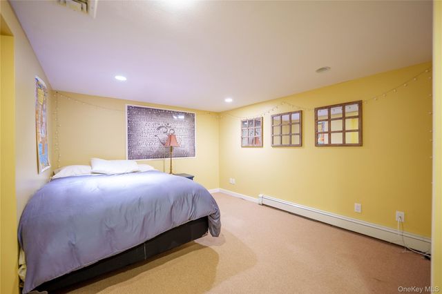 54 Farmington Lane, Melville, NY 11747