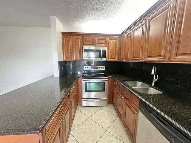 208 Lake Arbor Drive, Palm Springs, FL 33461