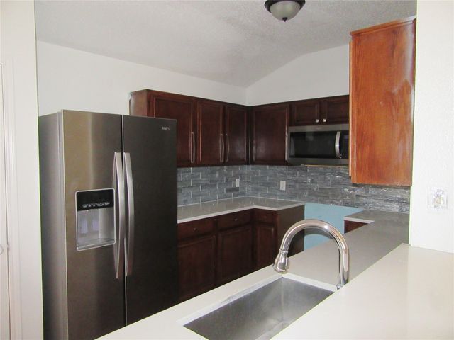 10415 Blackjack Oaks Drive, Dallas, TX 75227