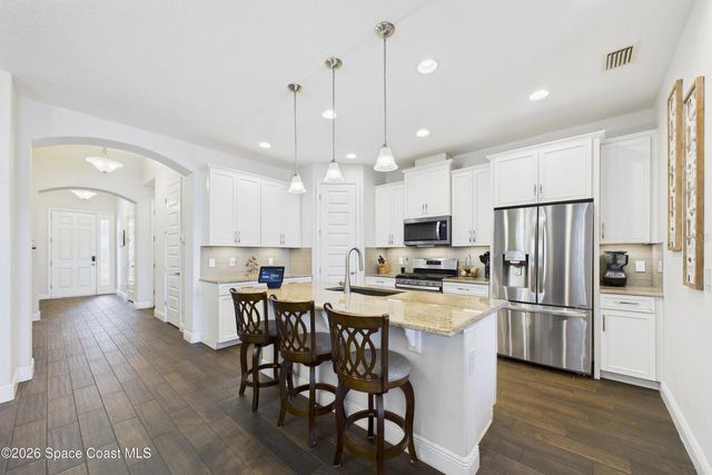 7663 POULICNY LANE, Melbourne, FL 32940