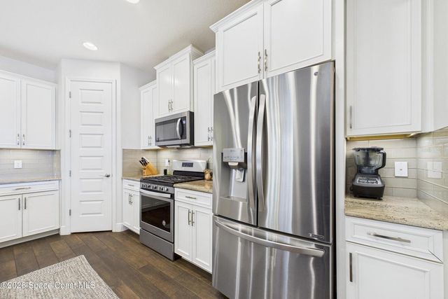 7663 POULICNY LANE, Melbourne, FL 32940