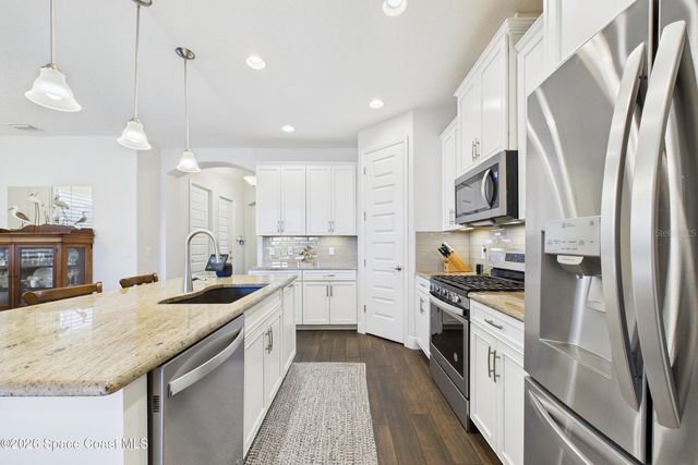 7663 POULICNY LANE, Melbourne, FL 32940