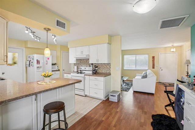 1409 N PEBBLE BEACH BOULEVARD, Sun City Center, FL 33573