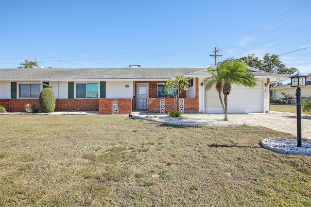 1409 N PEBBLE BEACH BOULEVARD, Sun City Center, FL 33573