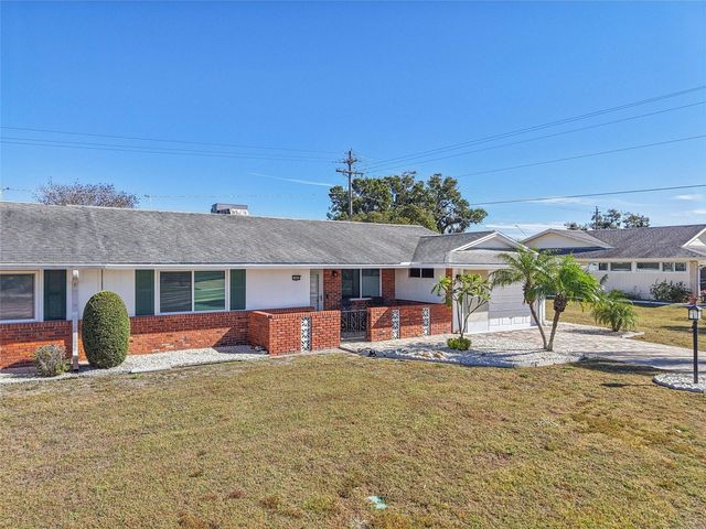 1409 N PEBBLE BEACH BOULEVARD, Sun City Center, FL 33573