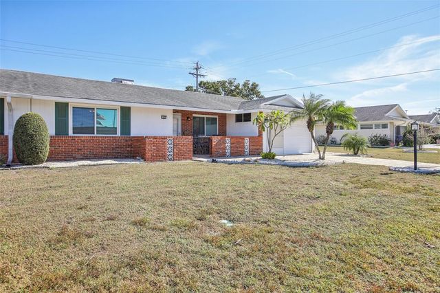 1409 N PEBBLE BEACH BOULEVARD, Sun City Center, FL 33573