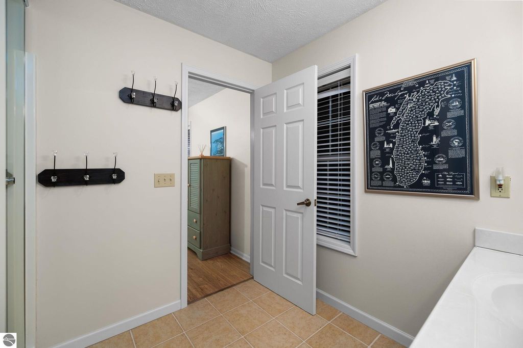 Image 18 of property listing at 5466 Millbrook Drive # 6, Williamsburg, MI 49690