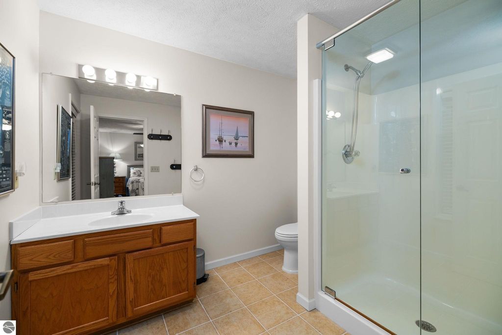 Image 19 of property listing at 5466 Millbrook Drive # 6, Williamsburg, MI 49690