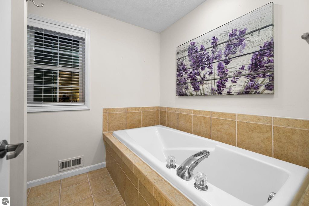 Image 24 of property listing at 5466 Millbrook Drive # 6, Williamsburg, MI 49690