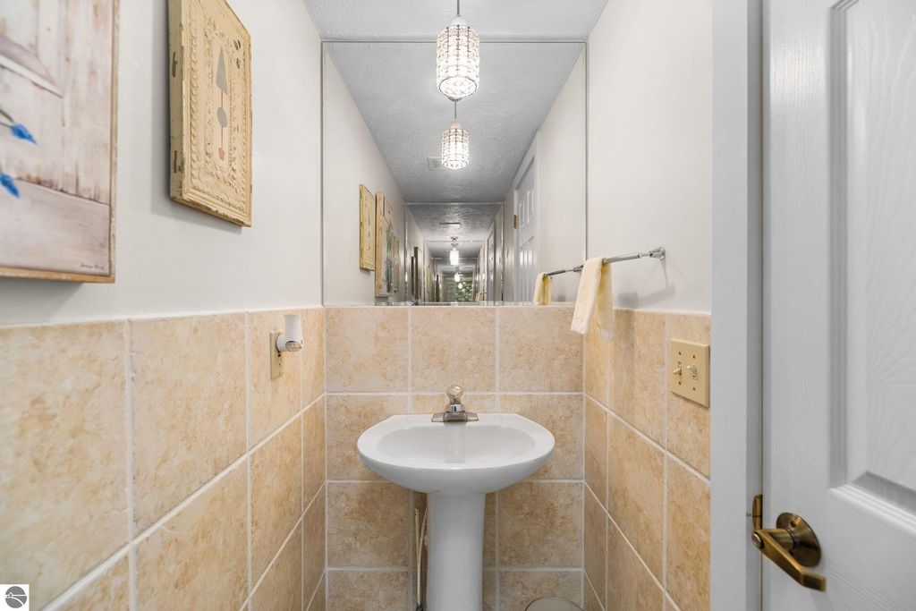 Image 7 of property listing at 5466 Millbrook Drive # 6, Williamsburg, MI 49690