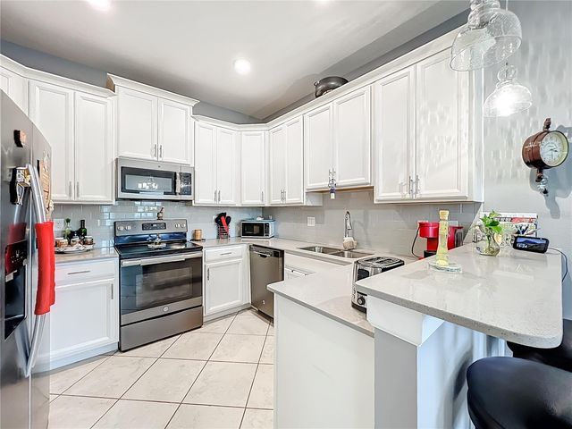 3556 BELLAND CIRCLE F, Clermont, FL 34711