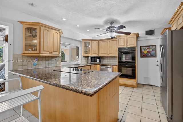 1051 W Tropical Way, Plantation, FL 33317